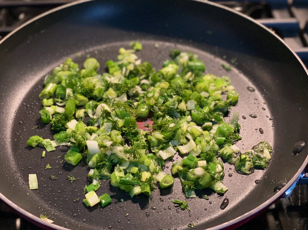sautéed dill and spring onions